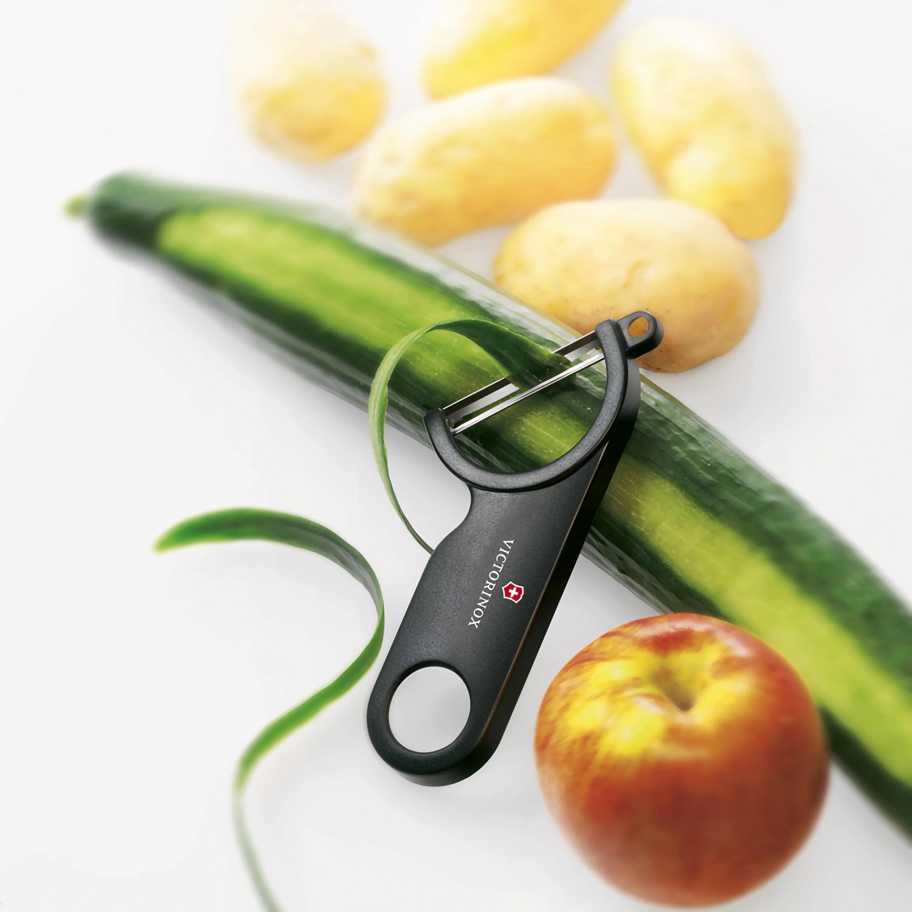 Pelapatate inox curvo