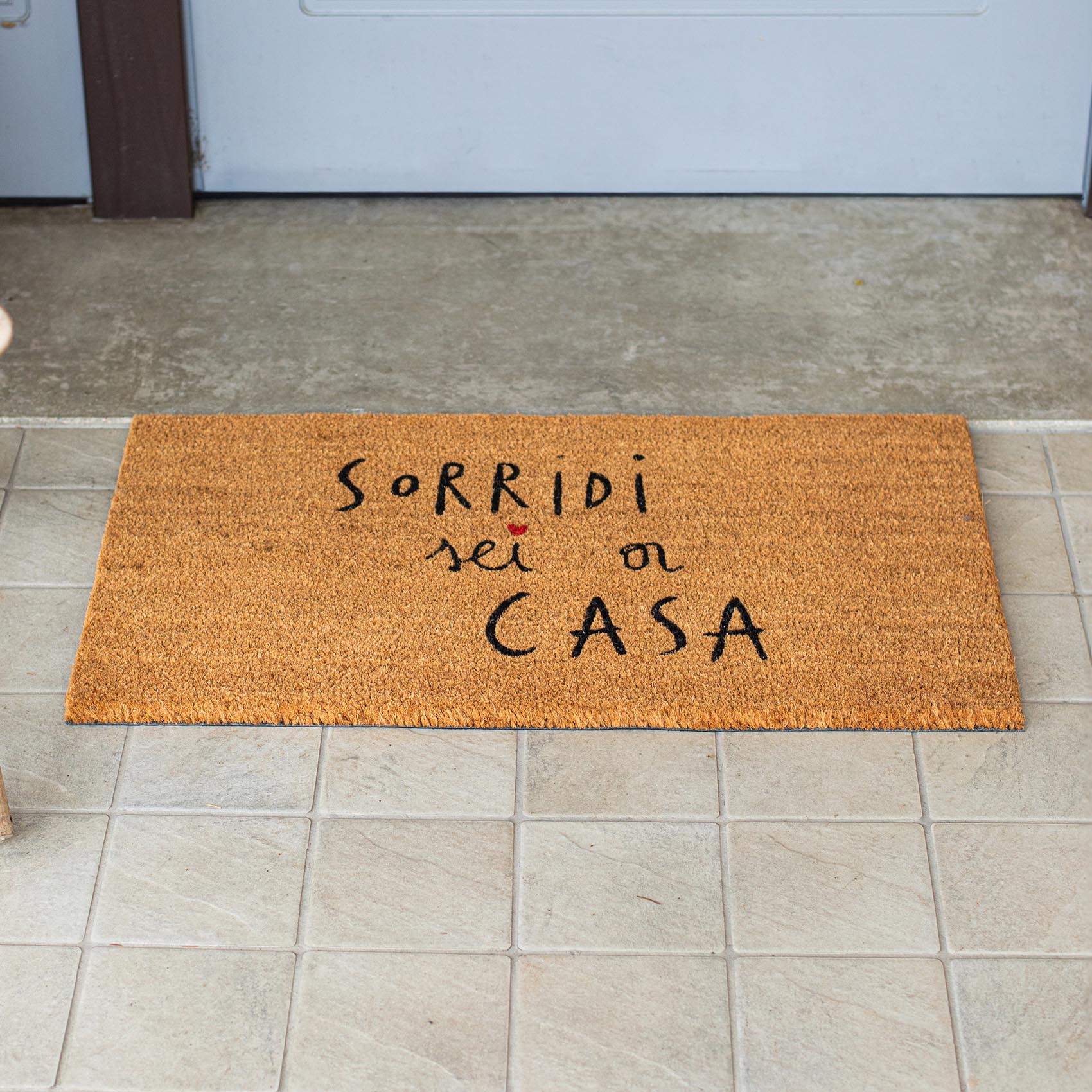 Zerbino "Sorridi sei a casa"